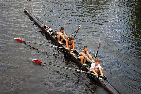 Reaching for the catch - the presence of any person or rowing program team colors in this photograph does not imply any type of sexual orientation