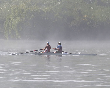 Rowers train at Lake Karapiro - the presence of any person or club colors in this photograph does not imply any type of sexual orientation