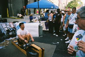 GLRF Photo: At NYPride04, erg man Mark demos for the crowd 