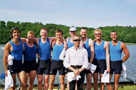 The Danish 8+ crew posing after their victory